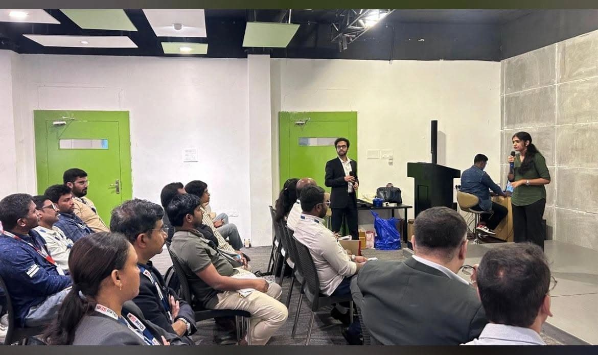 A presenter sharing ideas with conference attendees